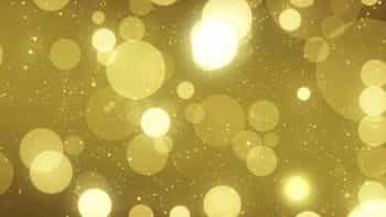 دانلود بک گراند موشن گرافیک پارتیکل طلایی 4K Large Gold Particles
